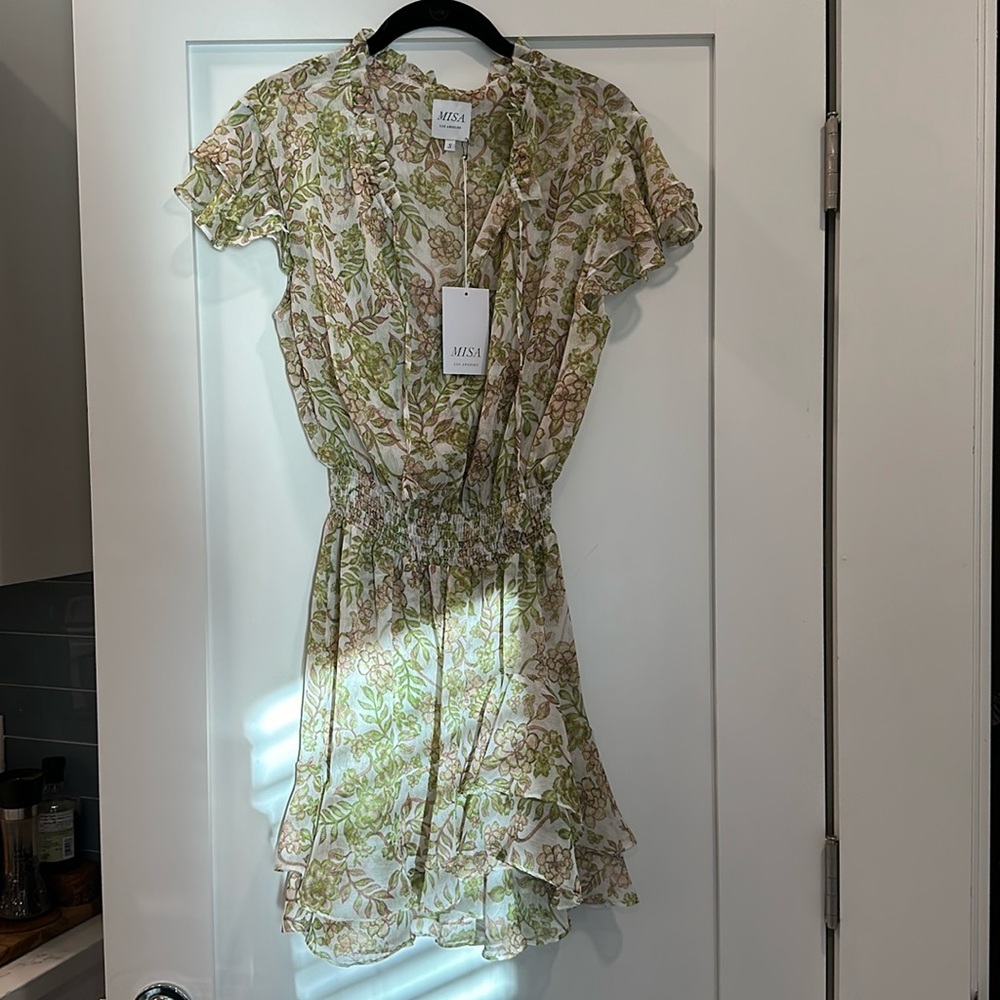 NWT Miss Los Angeles women’s dress. Never worn. Size Small. True to size.